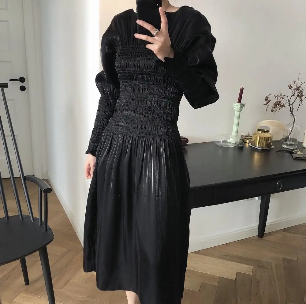 

woman fashion gorgeous dress black and champagne