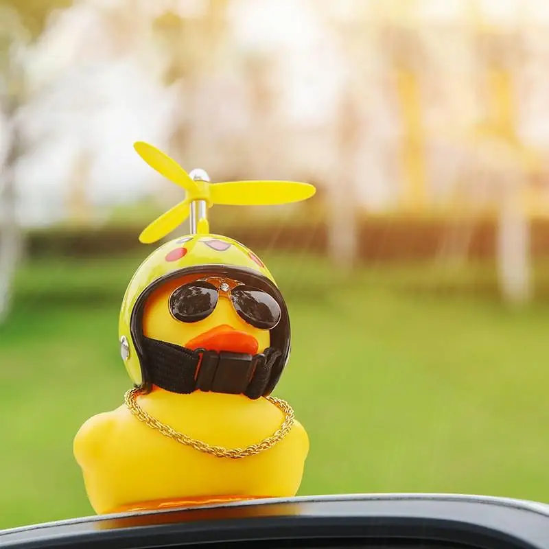 

Cute Little Yellow Duck With Helmet Propeller Rubber Windbreaker Duck Squeeze Sound Internal Car Decoration Ornaments Accessorie