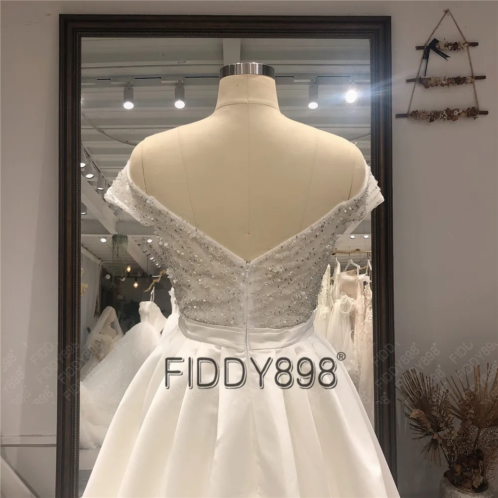 

Elegant Beaded A-Line Wedding Dresses for Women 2021 Off-Shoulder Front Slit Bride Wedding Gown Beach Bridal Dress with Bow