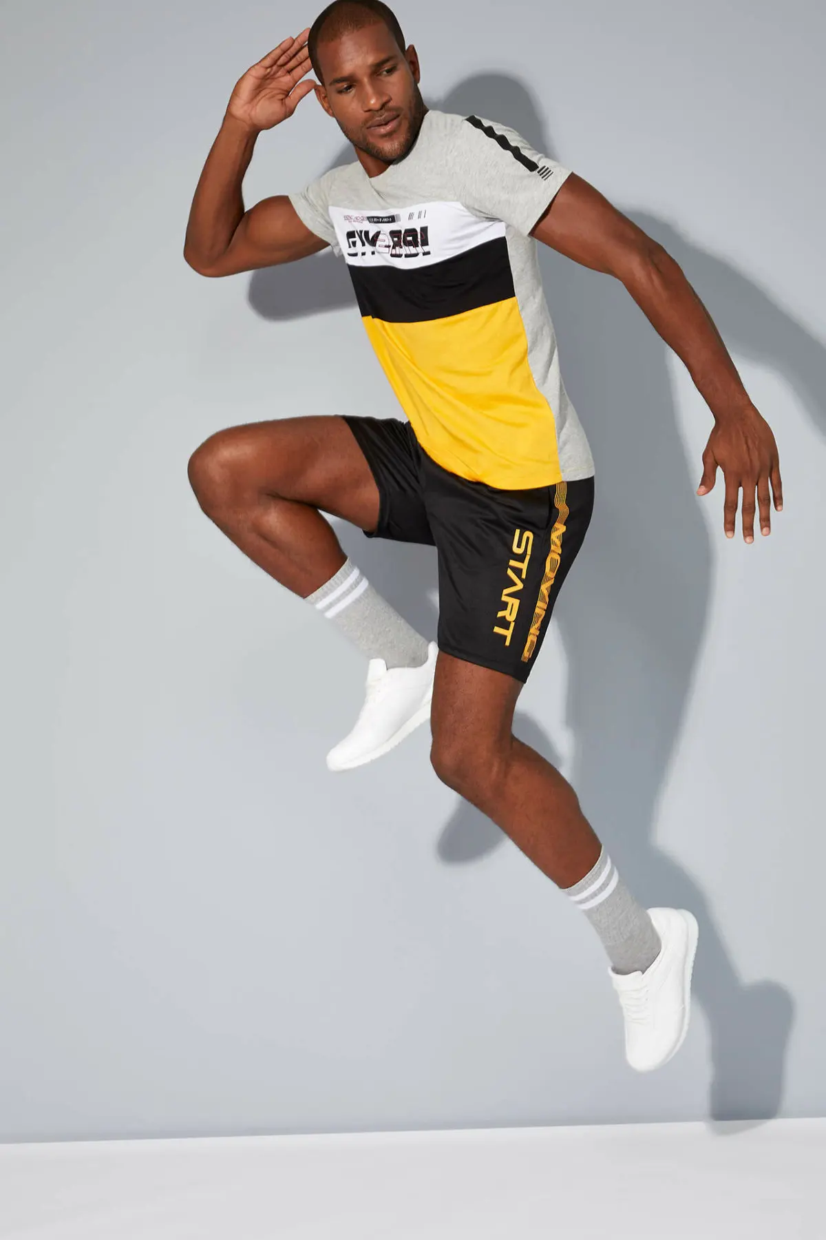 Дефакто летние мужские трикотажные брюки Модные с буквенным принтом сбоку