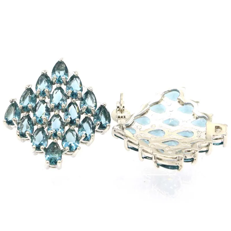 Серьги-гвоздики серебряные с голубым топазом и зеленым аметистом 28 х25 мм |