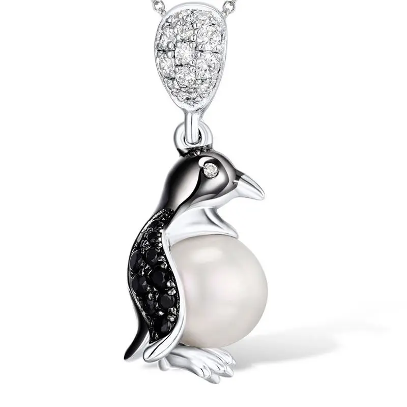 

Olivia Yip - Black Penguin with White Pearl Pendant