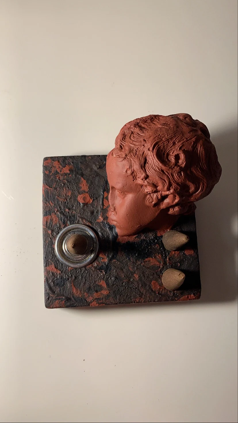 

Eros conical incense burners