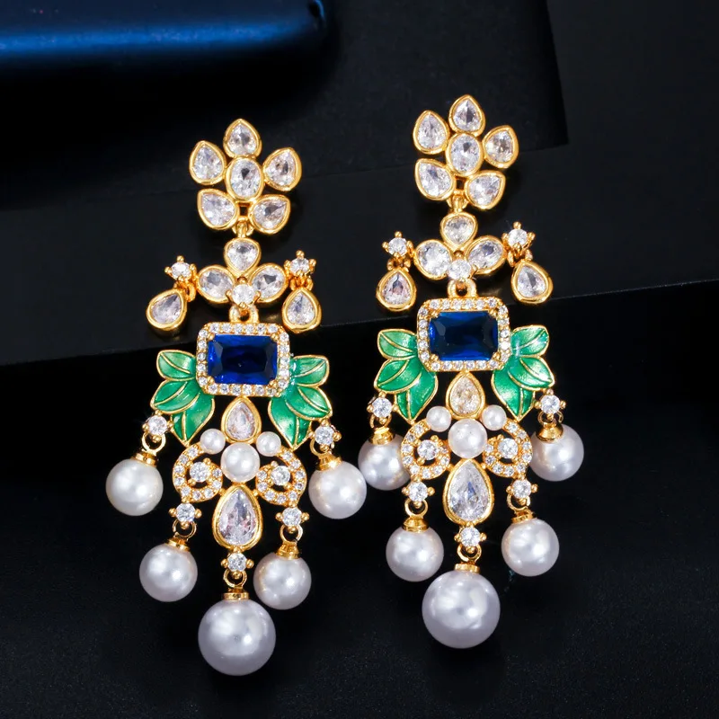 

New S925 Silver Needle Noble Temperament Shell Pearl and Wild Leaf Tassel Female Earrings