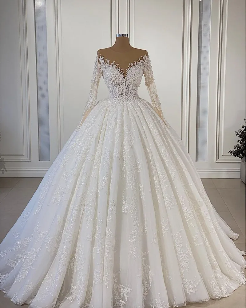 

Modest Princess Wedding Dresses for Bride Illusion Long Sleeves Lace Applique Pearls Arabic Bridal Gowns vestido de novia 2021