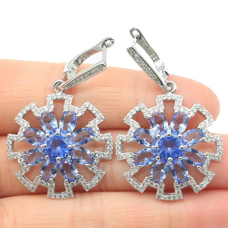 Комплект ювелирных изделий из фиолетового танзанита и розового турмалина с