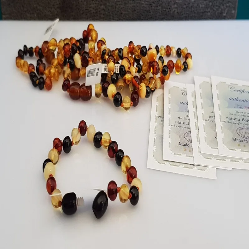 

Amber Healing Baby Teeth bangle 100% natural Baby tooth bracelet.