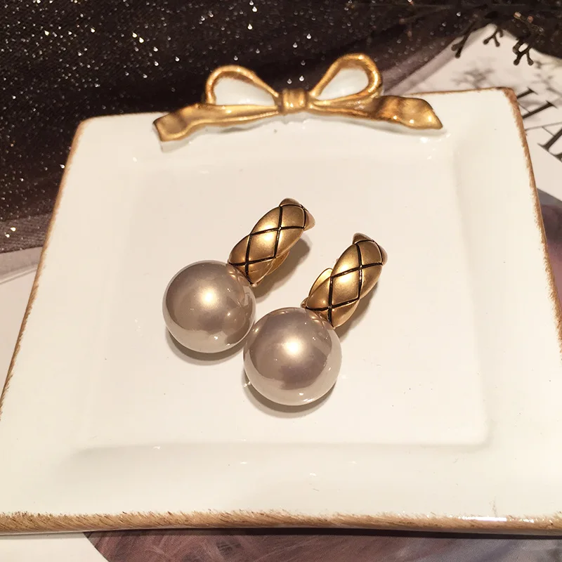 

S925 silver needle coffee colored pearl earrings