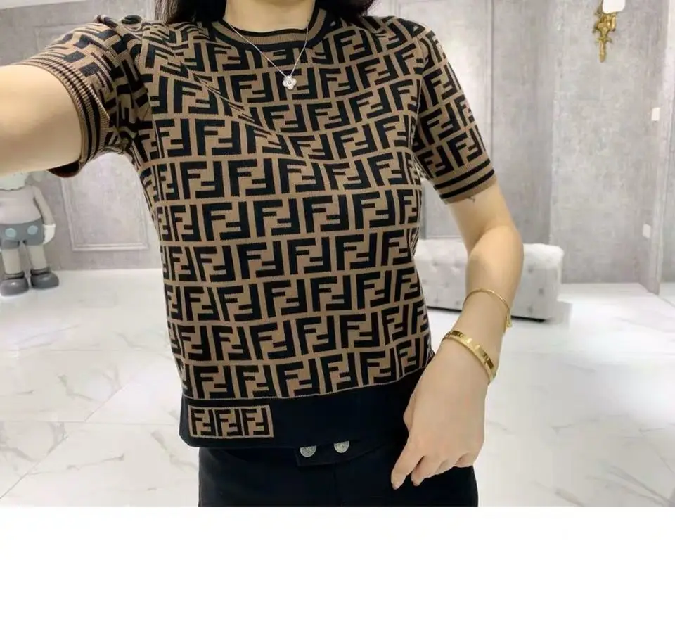 

A New Fashionable Round-Neck Sweater In The Summer Of 2021, A Short-Sleeved Woman With Slim, Thin T-Shirt And Trendy Top.