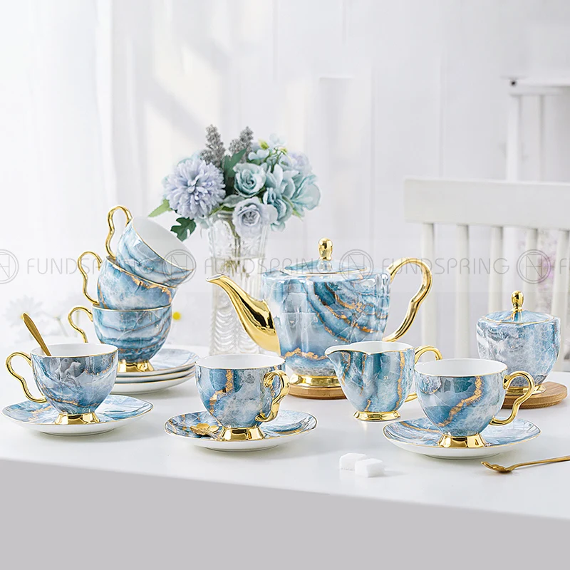 

Modern Light Luxury Bone China Coffee Cup Saucer Set British Ceramic Tea Set Set Of 15