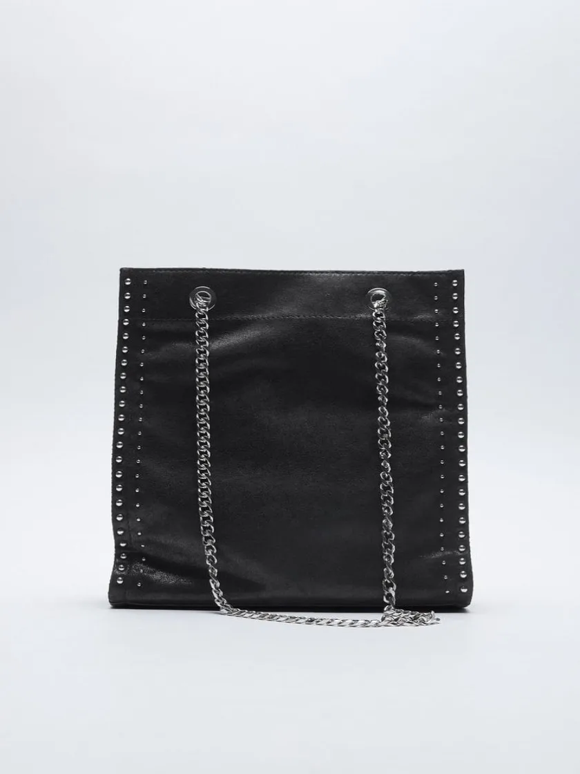 

Women ZARA 2021 STUNNING TOTE BAG BLACK TOTE BAG. METAL WITH REFLECTIVE EXTERIOR AND STAPLES AROUND THE CONTOUR. CHAIN SHOULDER