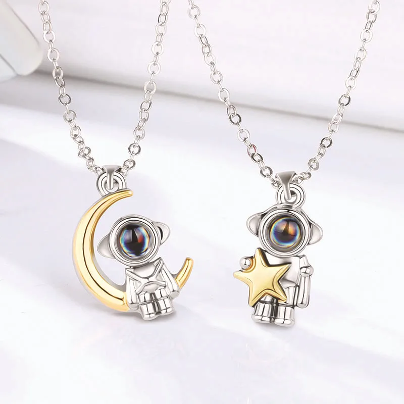 

2Pcs Cute Spaceman Couple Necklace 100 Languages I Love You Projection Pendant Necklace for Women Men Valentines day Gift
