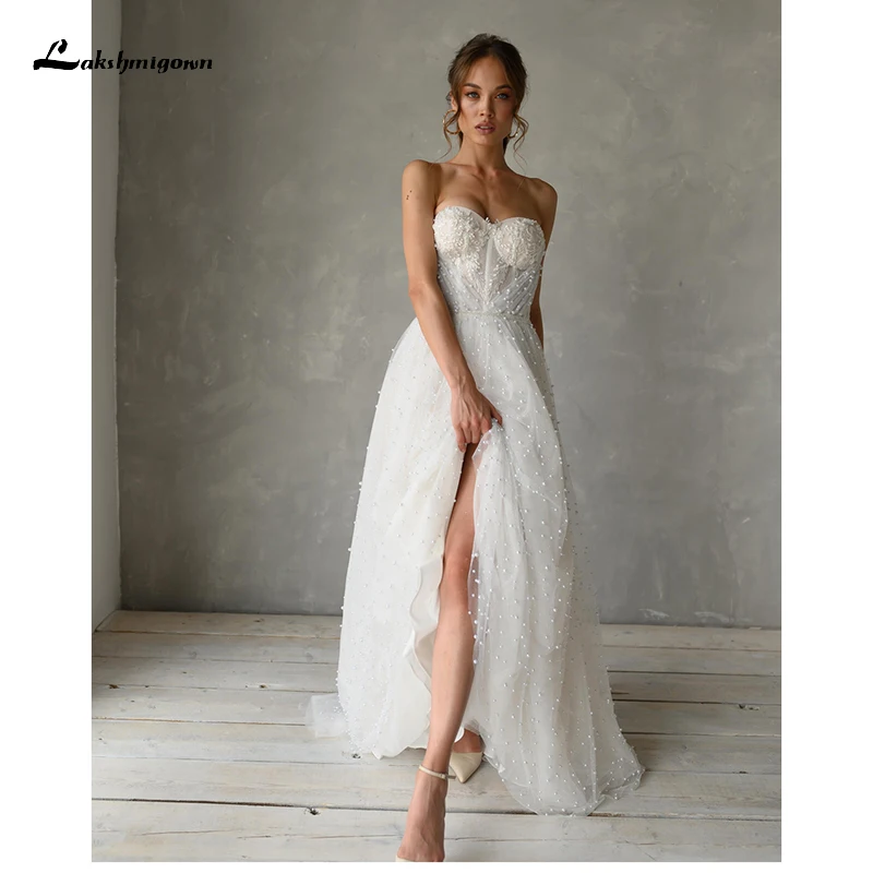 

Роскошные свадебные платья-трапеции в пол из органзы с аппликацией с жемчугом и пуговицами с коротким рукавом 2022