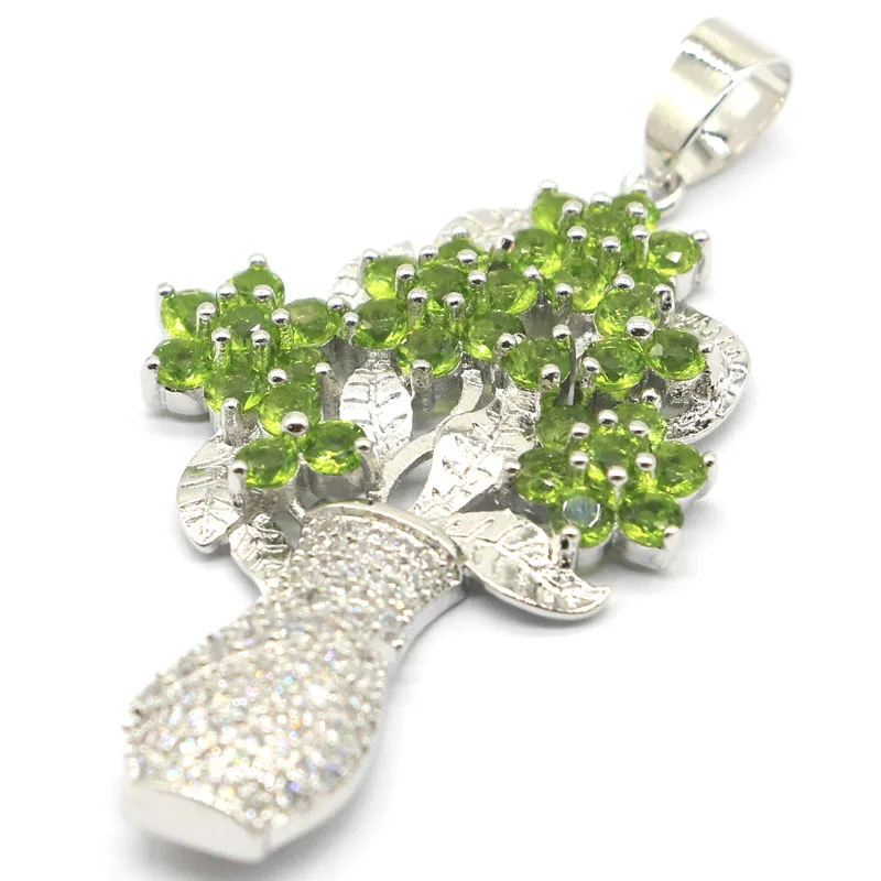 Большая роскошная ваза с зеленым Перидотом лондонским голубым топазом 57x29 мм