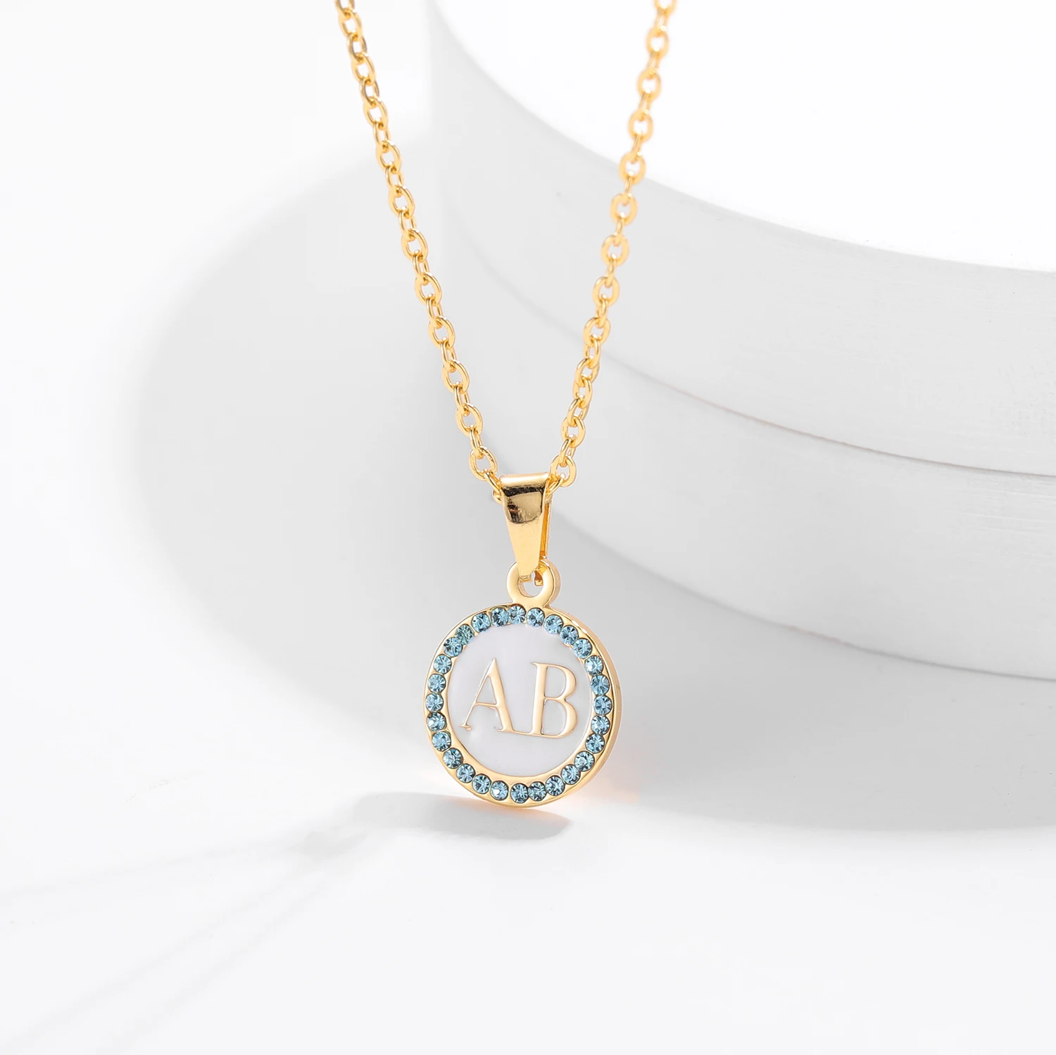 

Round Ice Out Stainless Steel Material Blue Diamond Double Letter Necklace Different Color Background Couple's Names 26 Letters