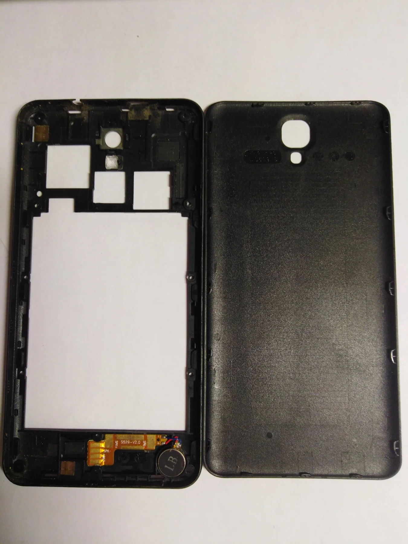 Задняя крышка для Fly FS504 Cirrus 2 в сборе с средней частью корпуса и вибромоторм