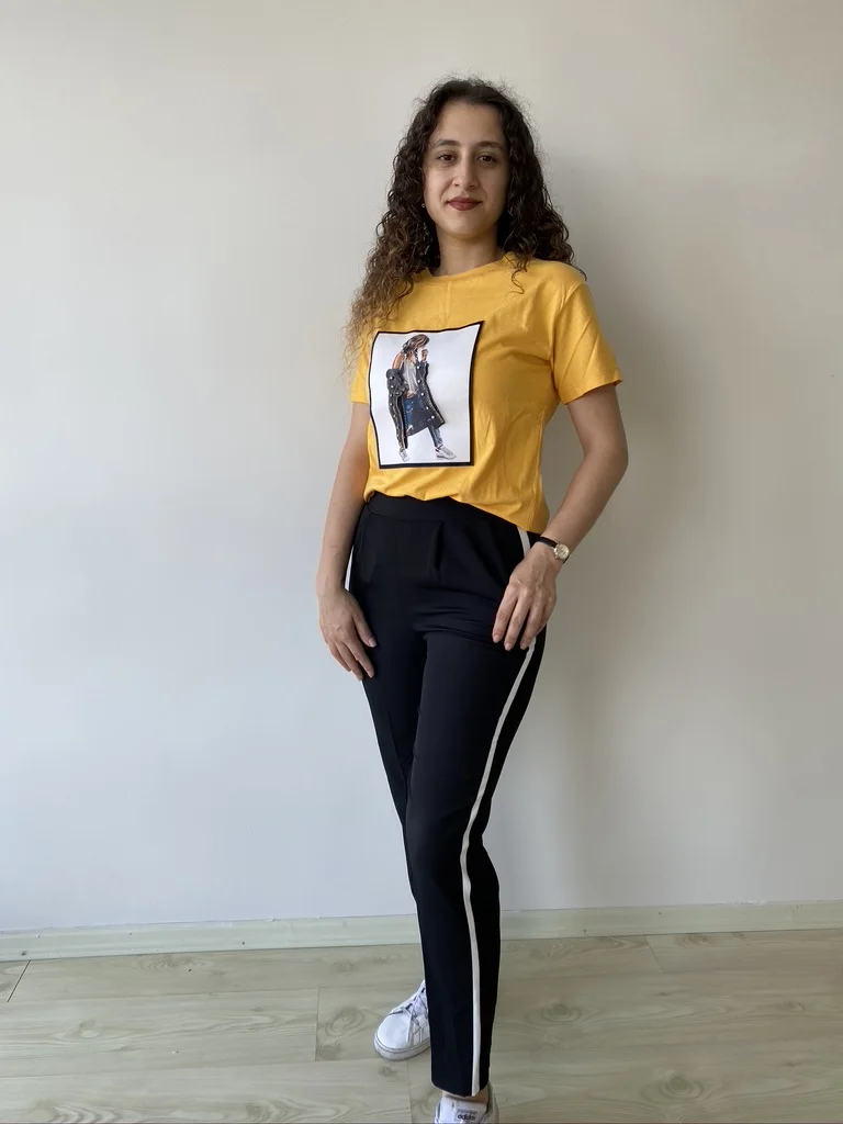 

Белые и черные брюки E2Butik по бокам