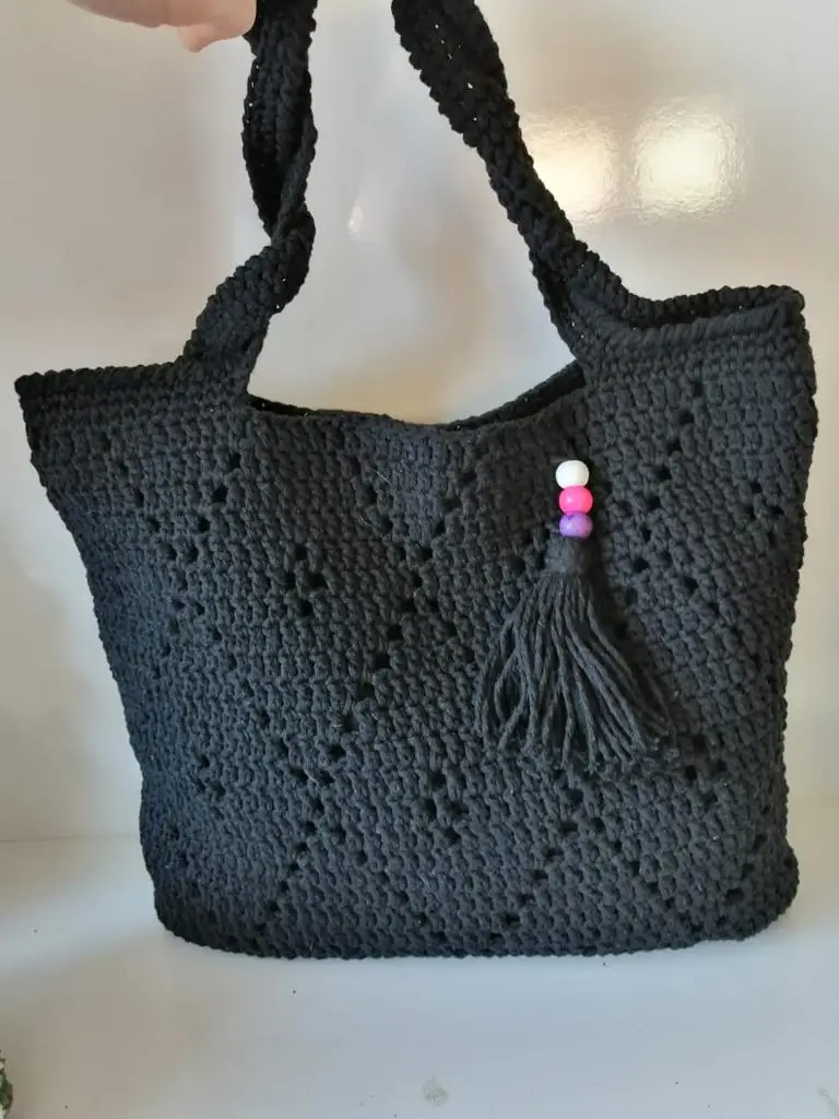 

handmade oval arm bag knitted from cotton yarn