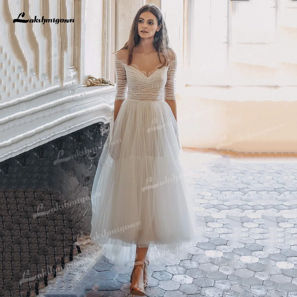 

Elegant Tulle A-Line Wedding Dresses O-Neck Half Sleeve Transparent Back Tea-Length Bride Gowns Pleats vestido de noiva curto