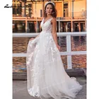 ТРАПЕЦИЕВИДНОЕсвадебное платье принцессы из фатина без рукавов с аппликацией и V-образным вырезом с низкой открытой спиной в пол со шлейфом винтажные пляжные свадебные платья