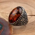 Мужское серебряное кольцо с янтарным камнем