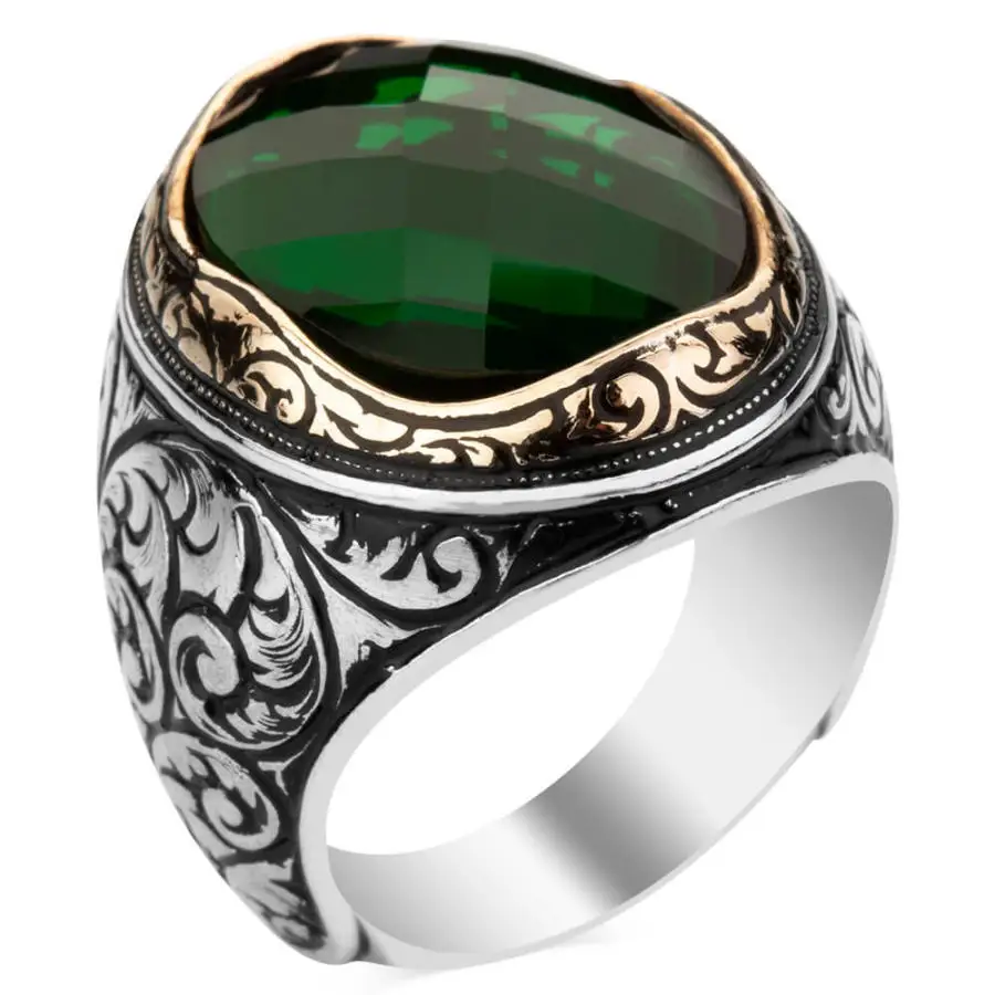 

Мужское кольцо из серебра 925 пробы с фигурной инкрустацией из зеленого циркония