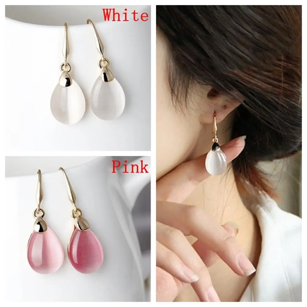 Женские серьги с кристаллами кошачий глаз розовый белый цвет опал в форме капли