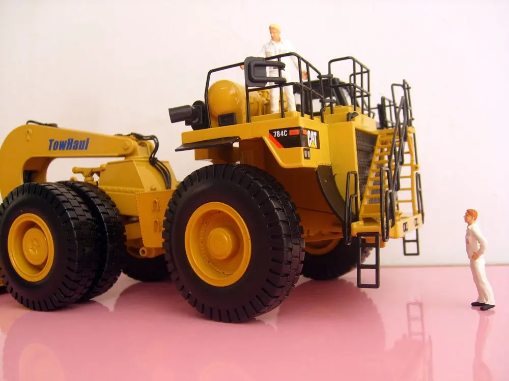 NORSCOT-55220 1:50 CAT 784C трактор с буксировщиком Trailertoy