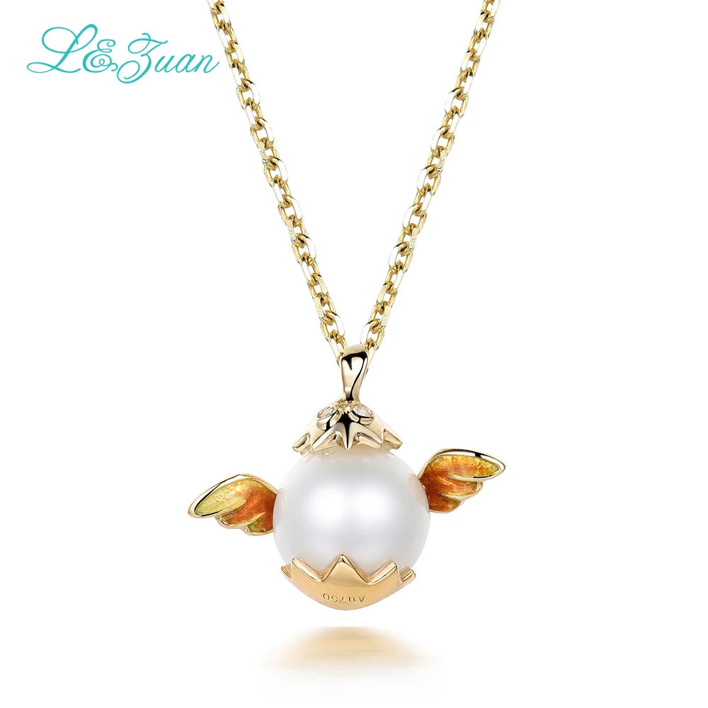 Кулон из серебра 0501 пробы с пресноводным жемчугом и крыльями желтого золота 18