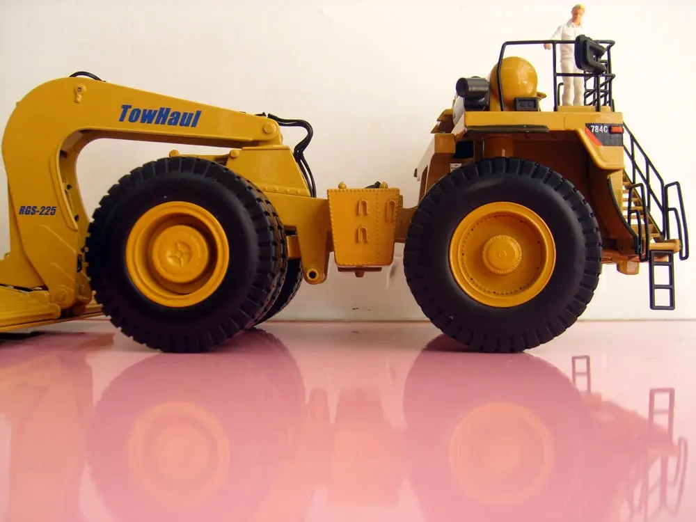 NORSCOT-55220 1:50 CAT 784C трактор с буксировщиком Trailertoy