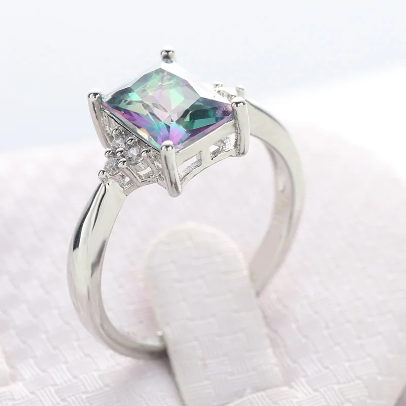 

Colored Zircon Ladies Rings Blue Show Elegant Temperament Jewelry Womens Girls White Silver Color Filled Wedding Ring