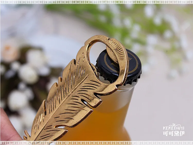 

Free Shipping Feather Design Bottle Opener Wedding Favors And Gifts Wedding Supplies Wedding Souvenirs Wedding Gifts For Guests