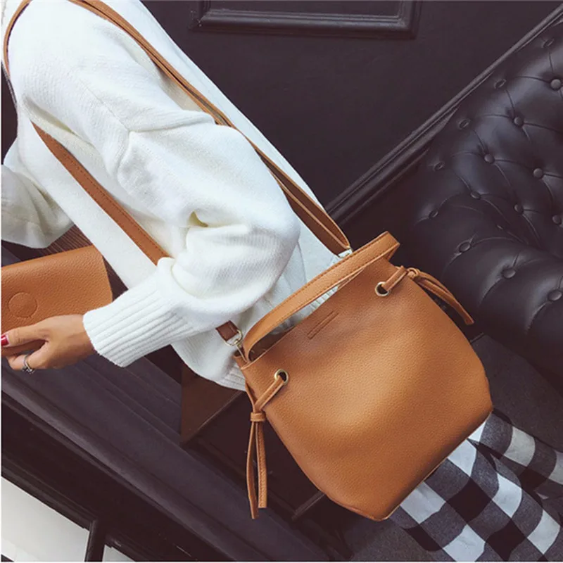 Модная однотонная сумка мешок женская кожа 2017 повседневная на шнурке через плечо