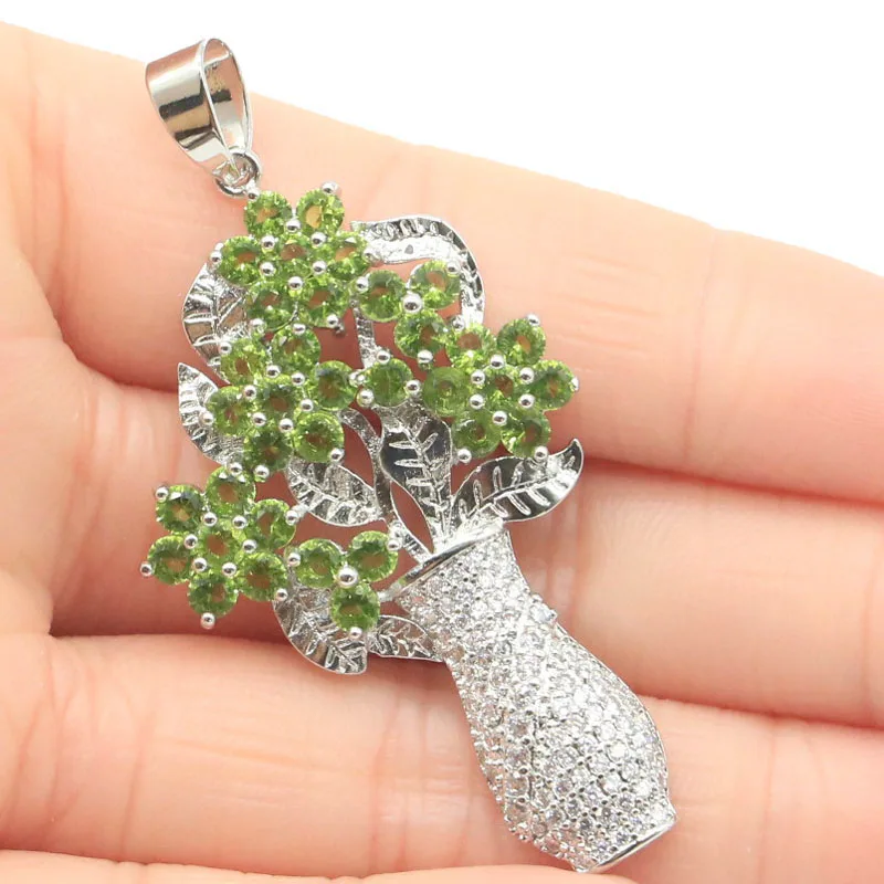 Большая роскошная ваза с зеленым Перидотом лондонским голубым топазом 57x29 мм