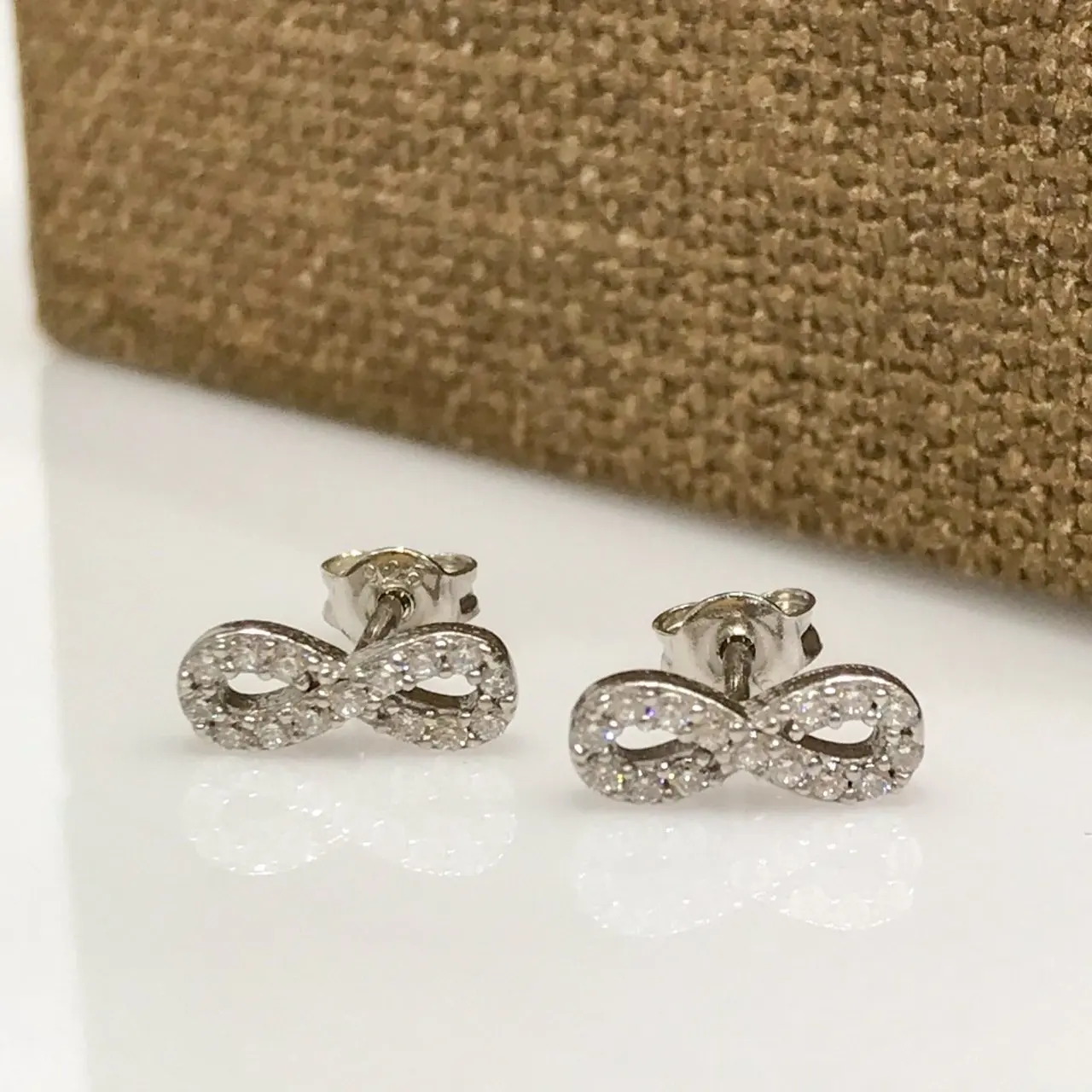 

Tiny Infinity Studded Silver Earrings