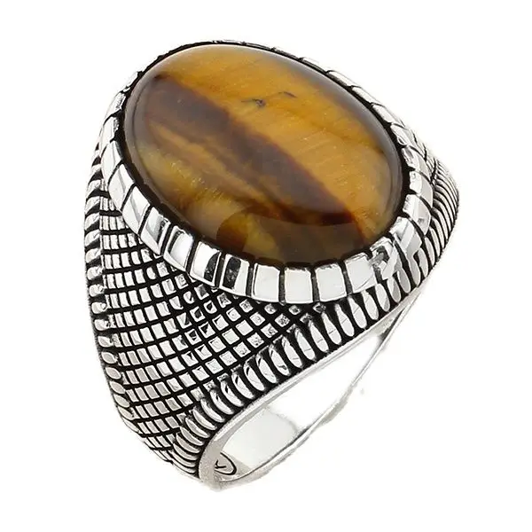 

Мужское кольцо из серебра пробы с овальным коричневым тигровым глазом