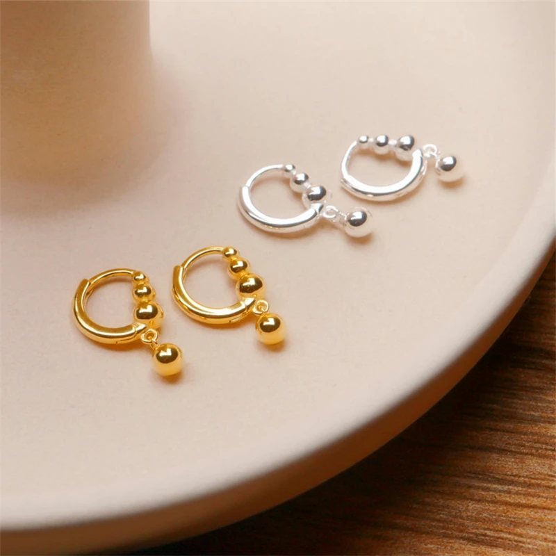 Серьги-гвоздики золотого и серебряного цветов с металлическим шариком |