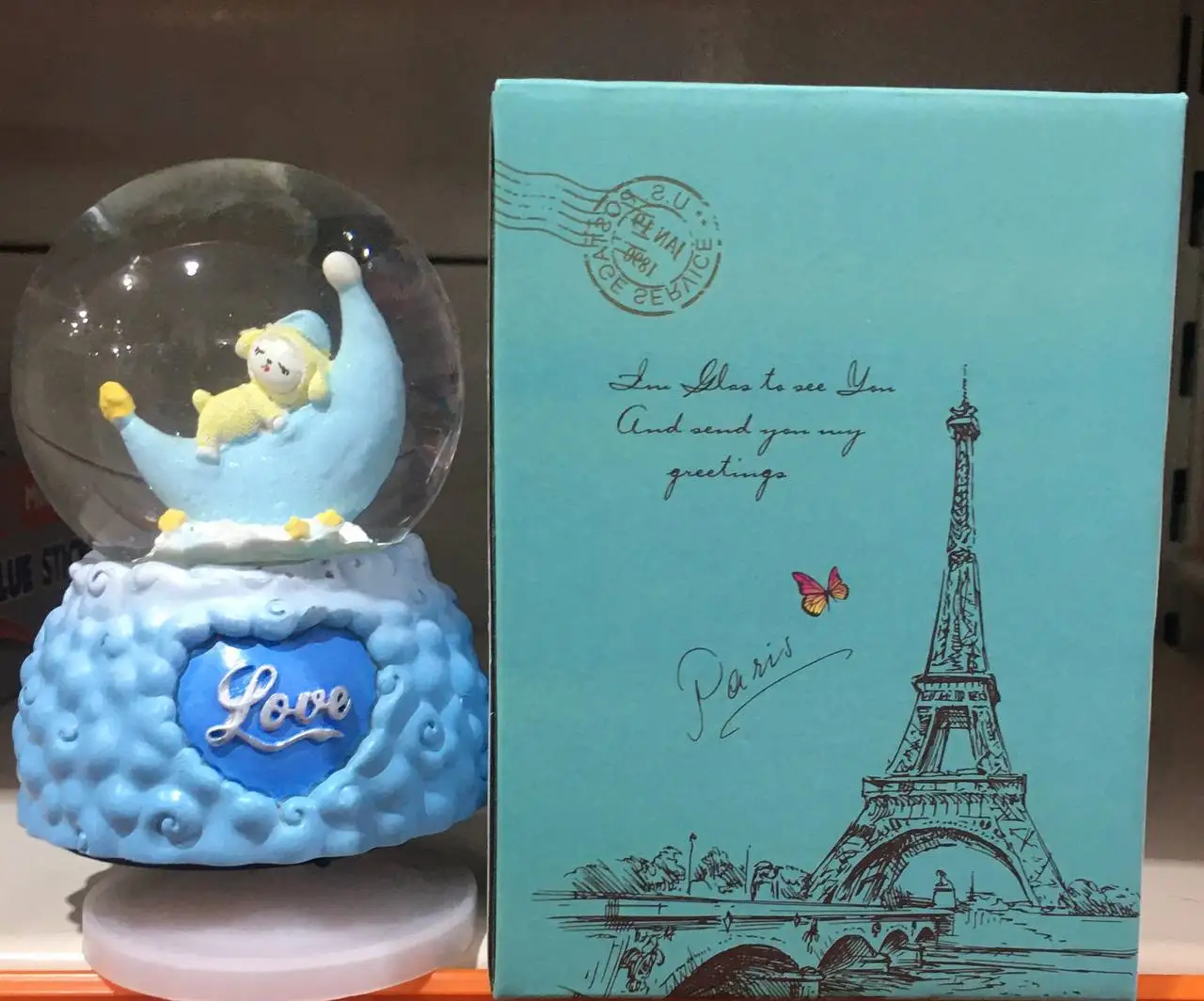 

Snow Globe Winter Tale Illuminated And Musical Night light Moon Decorated