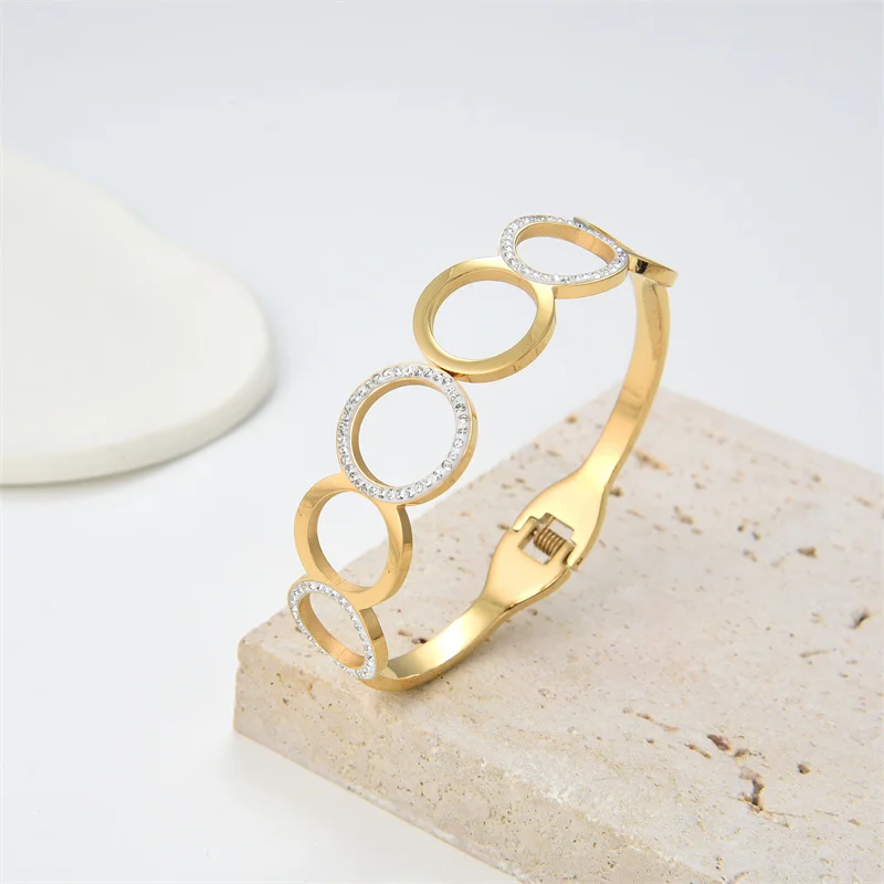 

2022 Hot Sale Elegant Gold Color Titanium Steel Bracelet Female Creative Hollow Zircon Round Geometric Couple Bracelet Jewelry