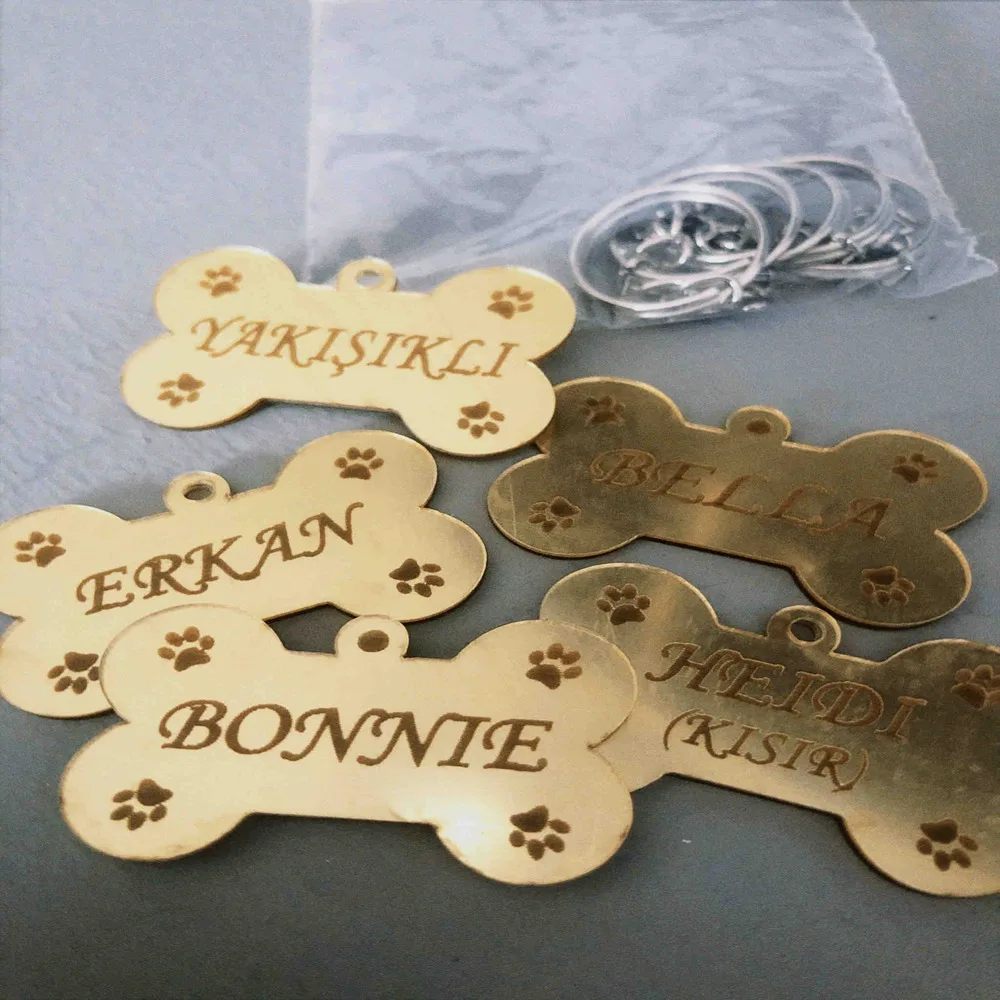 

Dog Tag Bone Shaped Plexi Gold Vs Silver Color Dog Disappearance Tag You can send the name by message. The phone number can be w