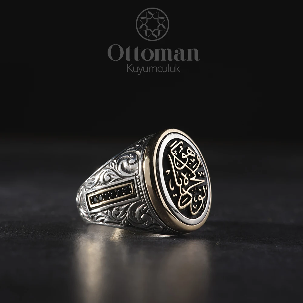 

THIS IS AN OVAL ENGRAVED SILVER RING