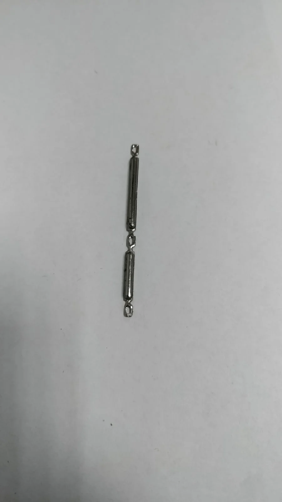 Толкатель кнопок громкости и включения (серебро) для Inoi 5I Lite с разбора Б/У |