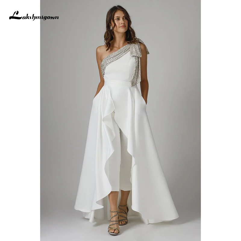 

Lakshmigown One Shoulder Bridal Jumpsuit with Detachable Over Skirt Sleeveless Satin Sequined Wedding Jumpsuit For women 2022