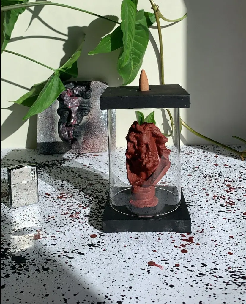 

Zeus with backflow incense burners