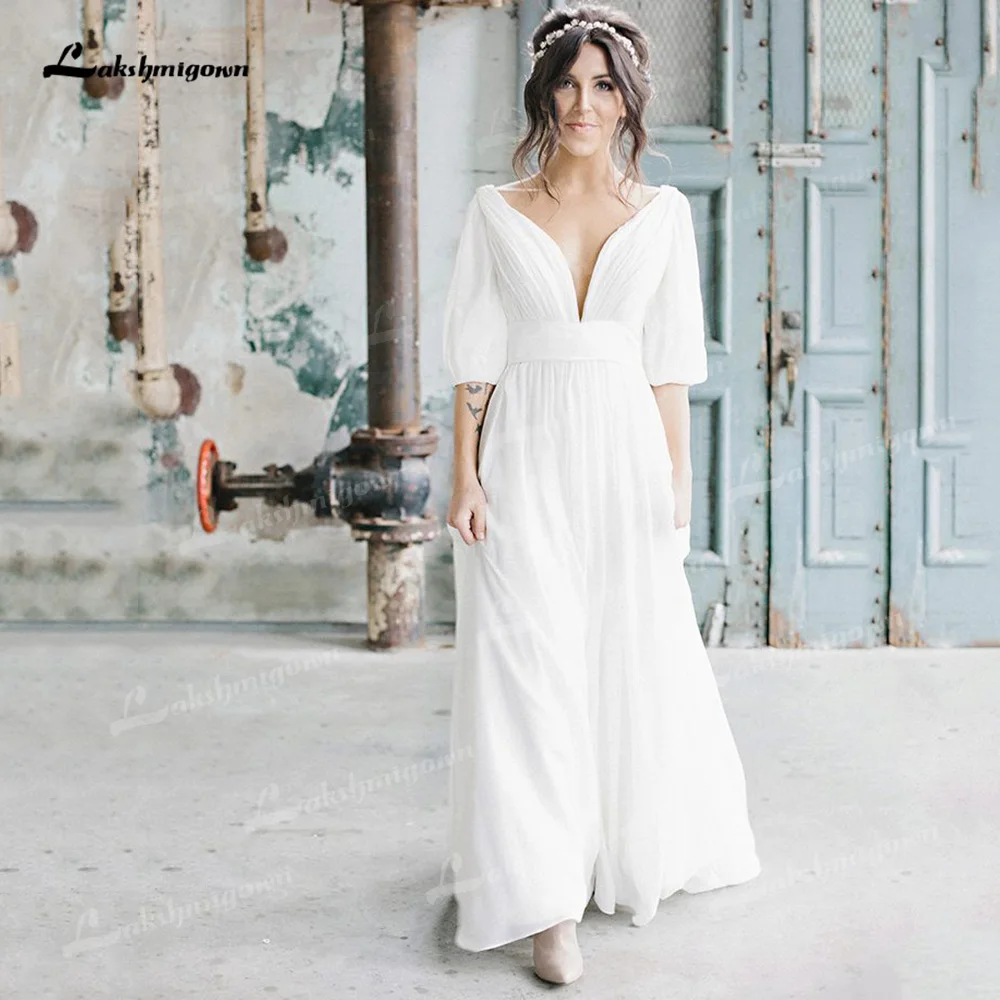 

Шифоновое свадебное платье-трапеция с глубоким V-образным вырезом, рукавом до локтя и открытой спиной