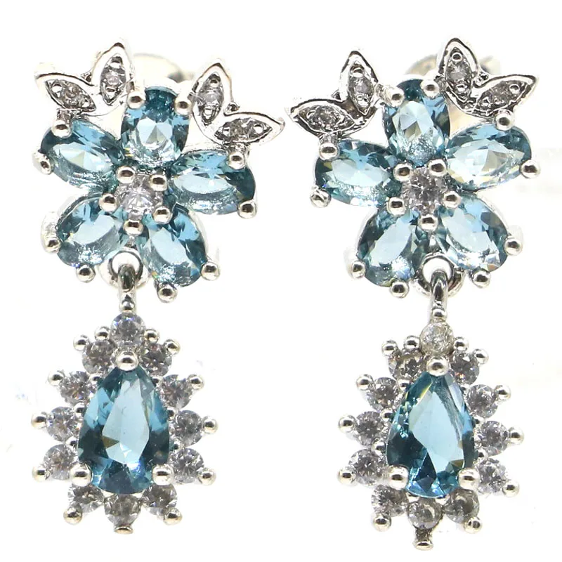 Великолепные серебряные серьги 23x12 мм с изображением лондонского голубого