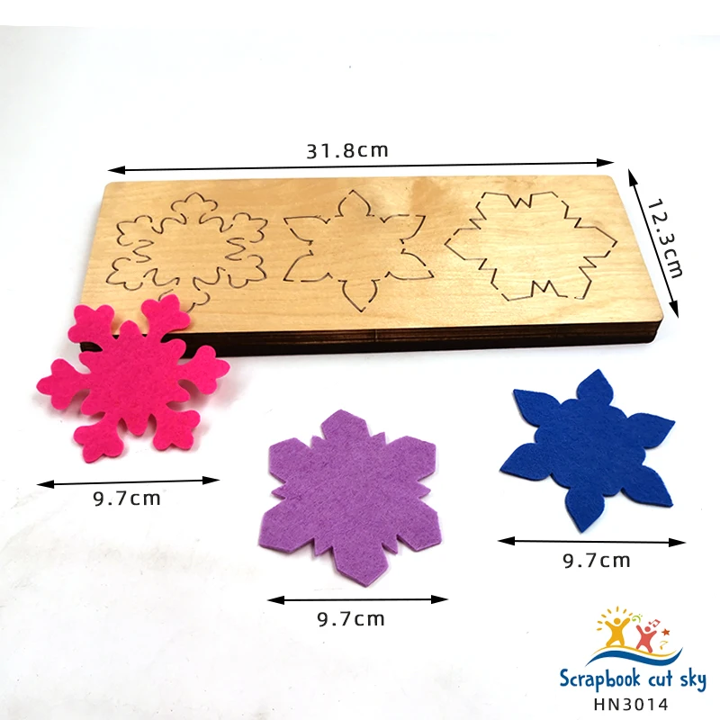 

Three pieces of snowflake die-cut wooden mold for scrapbooking
