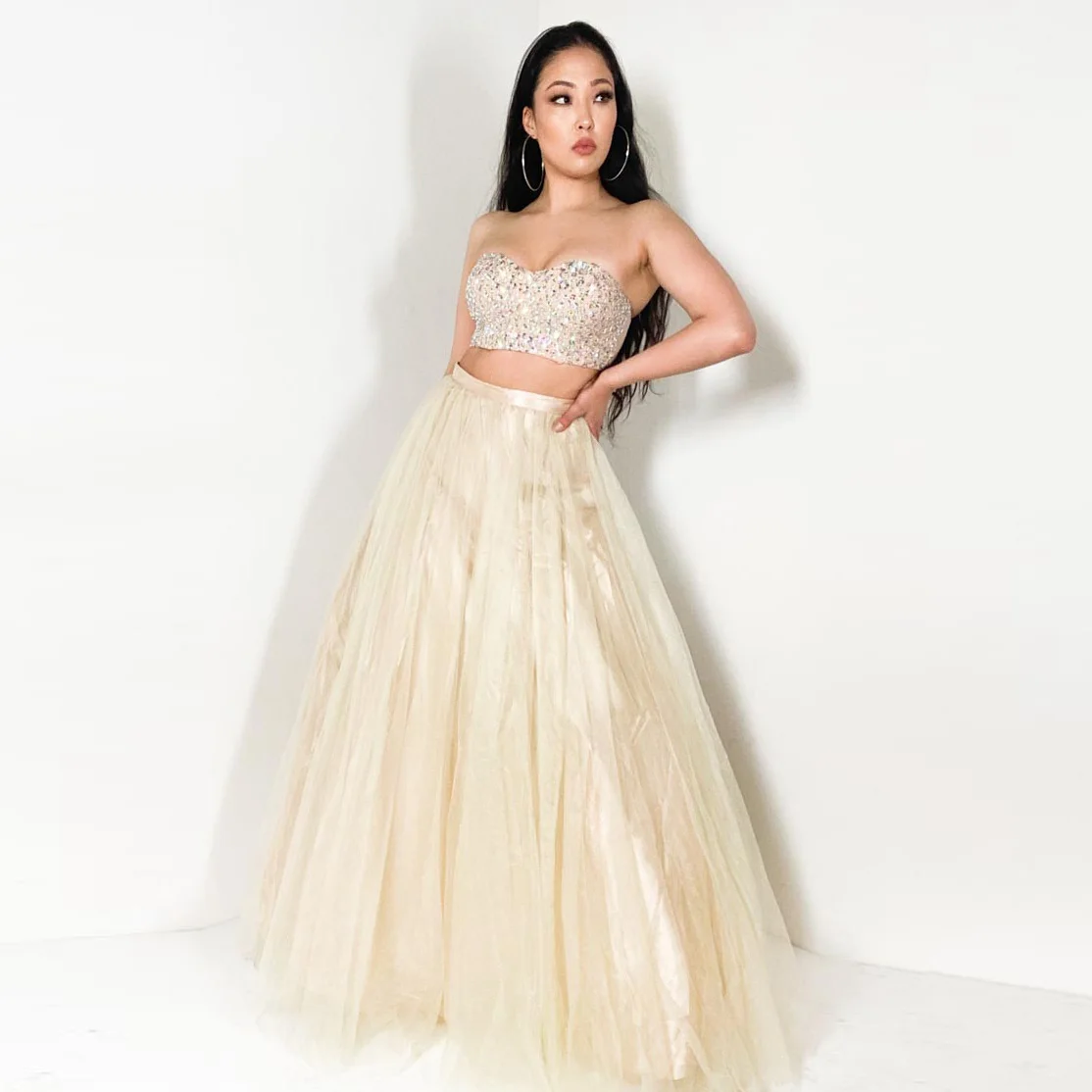 

Strapless Sweetheart Crystals Bead Crop Top and Floor Length Tulle Skirt With Satin Lining Solid Color Hanging Down Skirt