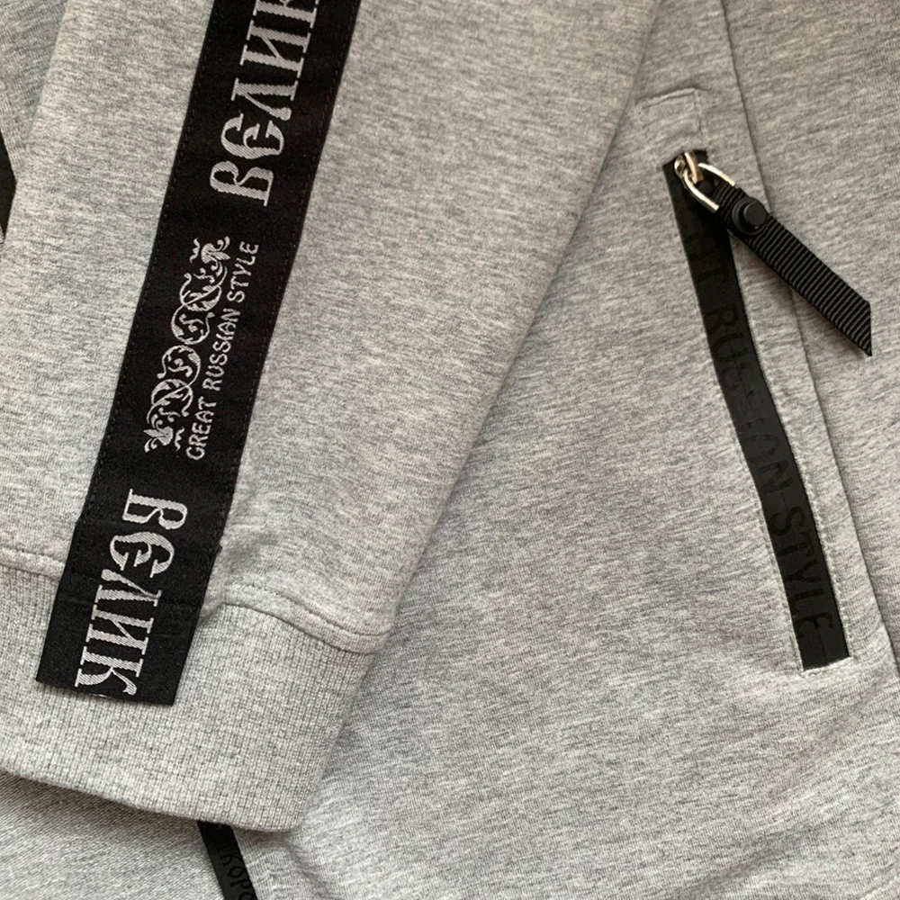 Спортивный костюм Великоросс цвета серый меланж жаккардовые лампасы и брендовые