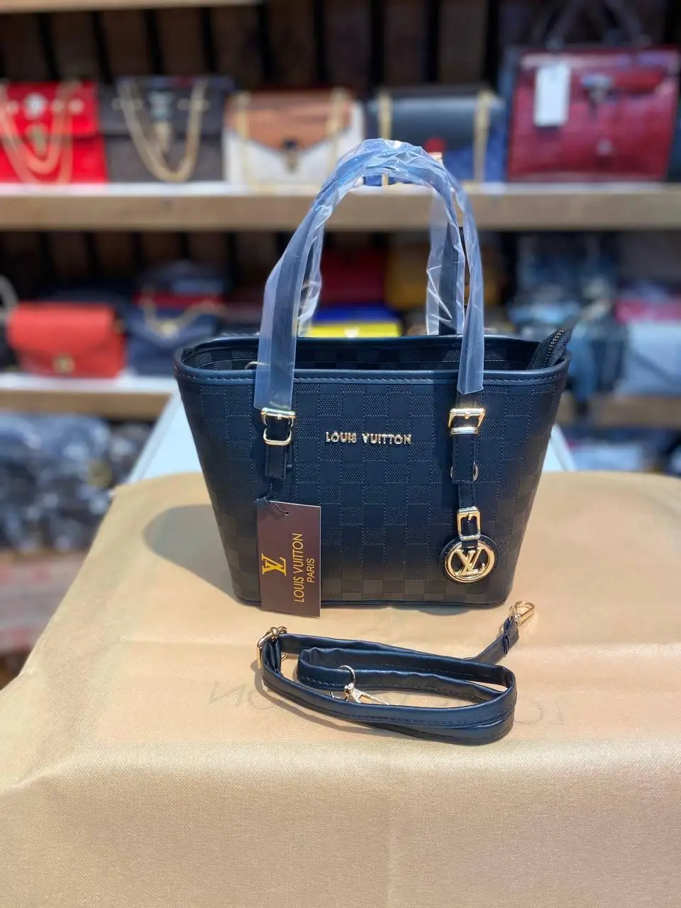 

1st quality faux leather tote bag. Invoice dust bag + bag